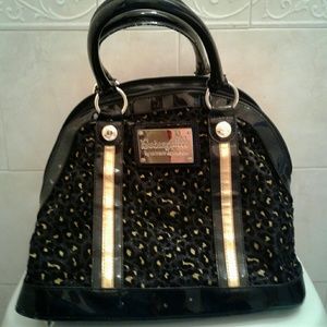 Black and gold Betsey Johnson bag